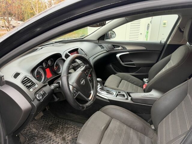 Черный Опель Инсигния, объемом двигателя 2 л и пробегом 100 тыс. км за 3450 $, фото 7 на Automoto.ua