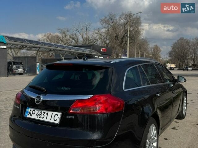 Черный Опель Инсигния, объемом двигателя 1.96 л и пробегом 190 тыс. км за 8600 $, фото 1 на Automoto.ua