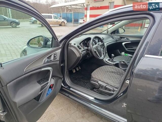 Чорний Опель Інсігнія, об'ємом двигуна 1.96 л та пробігом 179 тис. км за 6399 $, фото 10 на Automoto.ua