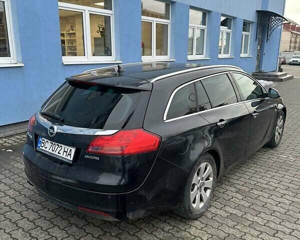 Чорний Опель Інсігнія, об'ємом двигуна 1.96 л та пробігом 306 тис. км за 6500 $, фото 5 на Automoto.ua