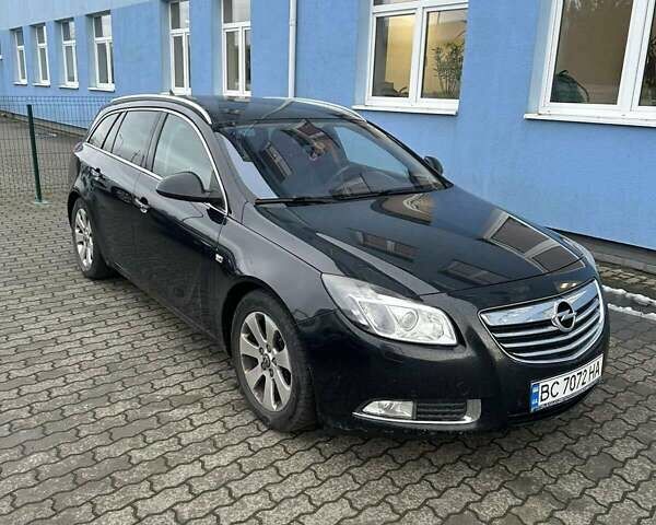 Чорний Опель Інсігнія, об'ємом двигуна 1.96 л та пробігом 306 тис. км за 6500 $, фото 7 на Automoto.ua