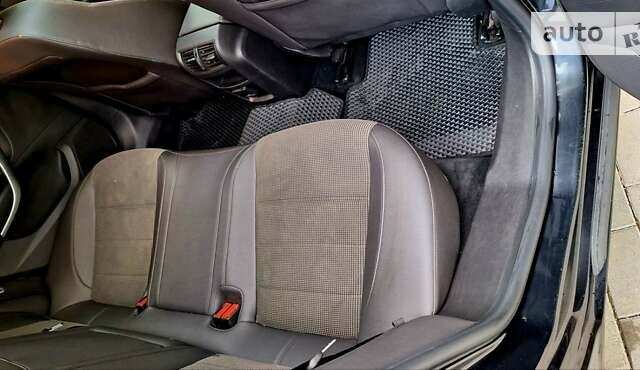Черный Опель Инсигния, объемом двигателя 2 л и пробегом 250 тыс. км за 7400 $, фото 23 на Automoto.ua