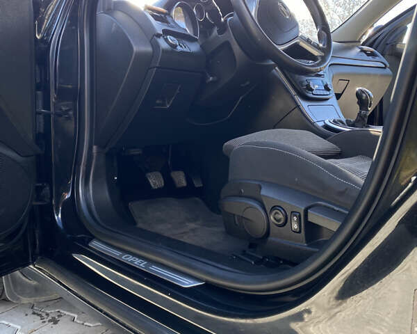 Чорний Опель Інсігнія, об'ємом двигуна 1.96 л та пробігом 231 тис. км за 7500 $, фото 4 на Automoto.ua