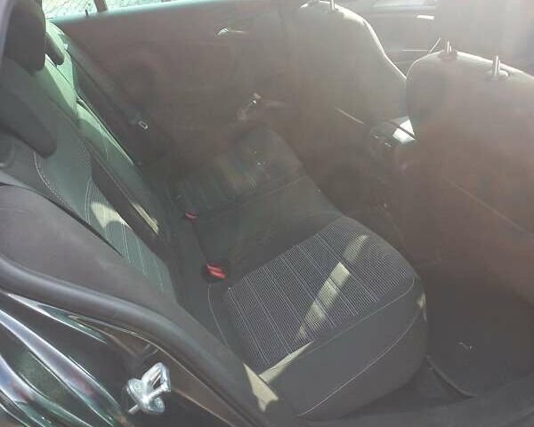 Черный Опель Инсигния, объемом двигателя 1.96 л и пробегом 372 тыс. км за 7200 $, фото 9 на Automoto.ua