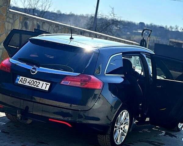Чорний Опель Інсігнія, об'ємом двигуна 2 л та пробігом 296 тис. км за 7000 $, фото 2 на Automoto.ua