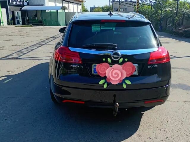 Чорний Опель Інсігнія, об'ємом двигуна 2 л та пробігом 323 тис. км за 7461 $, фото 1 на Automoto.ua