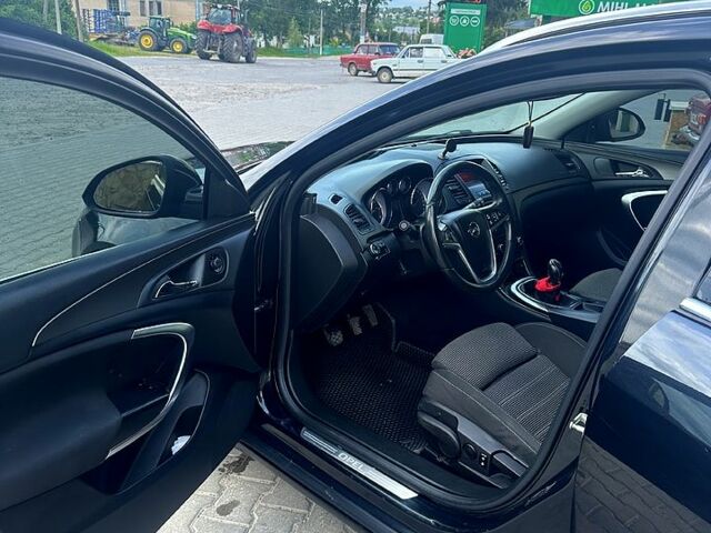 Черный Опель Инсигния, объемом двигателя 2 л и пробегом 296 тыс. км за 7000 $, фото 9 на Automoto.ua