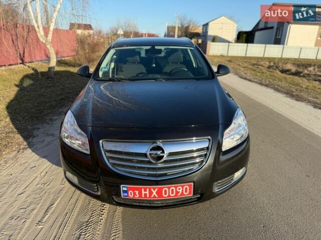 Черный Опель Инсигния, объемом двигателя 1.6 л и пробегом 206 тыс. км за 8000 $, фото 1 на Automoto.ua