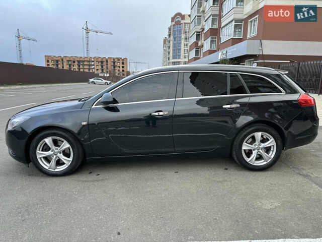 Черный Опель Инсигния, объемом двигателя 2 л и пробегом 194 тыс. км за 7500 $, фото 7 на Automoto.ua