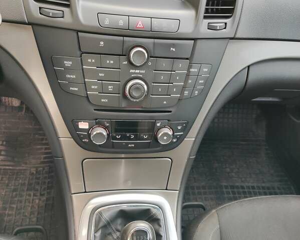 Черный Опель Инсигния, объемом двигателя 2 л и пробегом 278 тыс. км за 7500 $, фото 1 на Automoto.ua