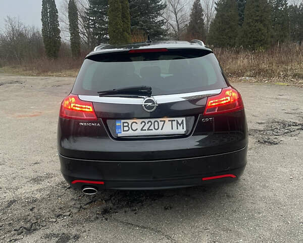 Чорний Опель Інсігнія, об'ємом двигуна 1.96 л та пробігом 276 тис. км за 8000 $, фото 7 на Automoto.ua