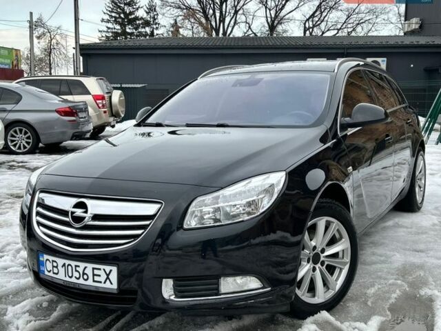Чорний Опель Інсігнія, об'ємом двигуна 2 л та пробігом 320 тис. км за 6500 $, фото 1 на Automoto.ua