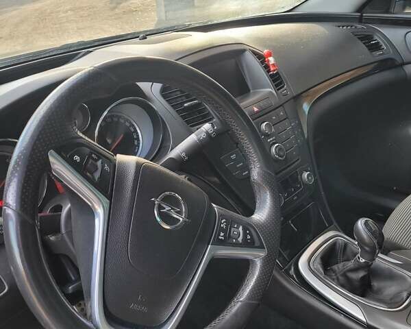 Чорний Опель Інсігнія, об'ємом двигуна 1.96 л та пробігом 225 тис. км за 7500 $, фото 1 на Automoto.ua