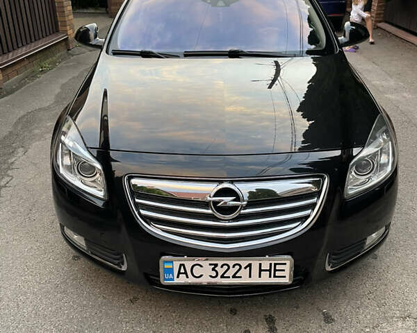 Черный Опель Инсигния, объемом двигателя 2 л и пробегом 307 тыс. км за 8500 $, фото 1 на Automoto.ua