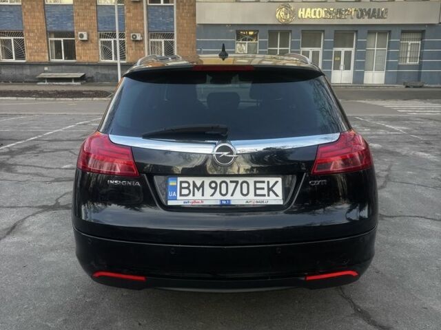 Чорний Опель Інсігнія, об'ємом двигуна 2 л та пробігом 309 тис. км за 6600 $, фото 6 на Automoto.ua