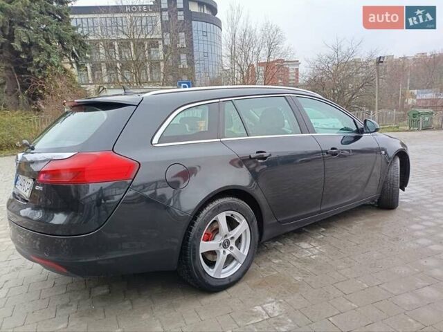 Чорний Опель Інсігнія, об'ємом двигуна 1.96 л та пробігом 179 тис. км за 6399 $, фото 2 на Automoto.ua