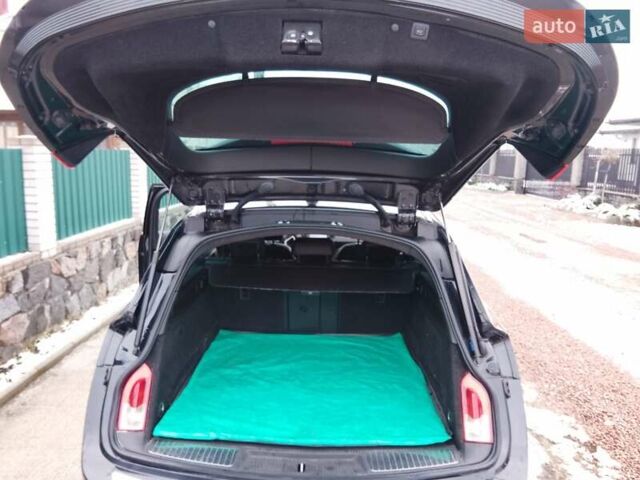 Чорний Опель Інсігнія, об'ємом двигуна 2 л та пробігом 217 тис. км за 9250 $, фото 27 на Automoto.ua