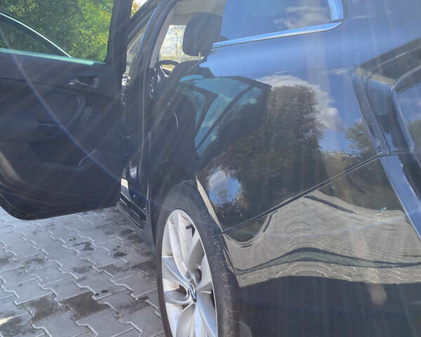 Чорний Опель Інсігнія, об'ємом двигуна 1.96 л та пробігом 231 тис. км за 7500 $, фото 5 на Automoto.ua