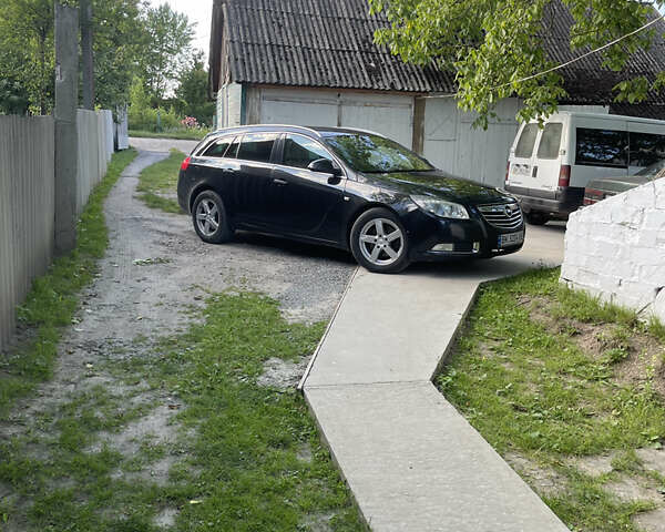 Чорний Опель Інсігнія, об'ємом двигуна 1.96 л та пробігом 390 тис. км за 8500 $, фото 4 на Automoto.ua