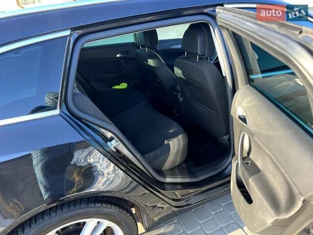 Черный Опель Инсигния, объемом двигателя 1.6 л и пробегом 200 тыс. км за 7999 $, фото 13 на Automoto.ua