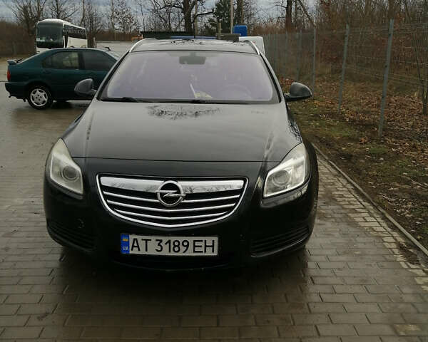 Черный Опель Инсигния, объемом двигателя 2 л и пробегом 310 тыс. км за 7500 $, фото 1 на Automoto.ua