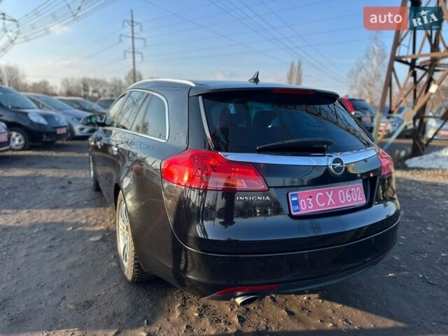 Чорний Опель Інсігнія, об'ємом двигуна 1.8 л та пробігом 242 тис. км за 6999 $, фото 5 на Automoto.ua