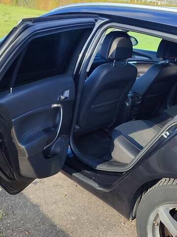 Чорний Опель Інсігнія, об'ємом двигуна 1.96 л та пробігом 267 тис. км за 7545 $, фото 7 на Automoto.ua