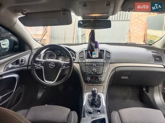 Черный Опель Инсигния, объемом двигателя 1.96 л и пробегом 206 тыс. км за 7200 $, фото 7 на Automoto.ua