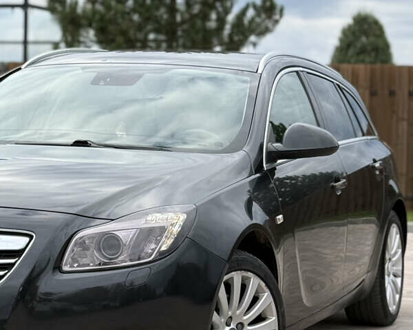 Черный Опель Инсигния, объемом двигателя 2 л и пробегом 292 тыс. км за 5900 $, фото 1 на Automoto.ua