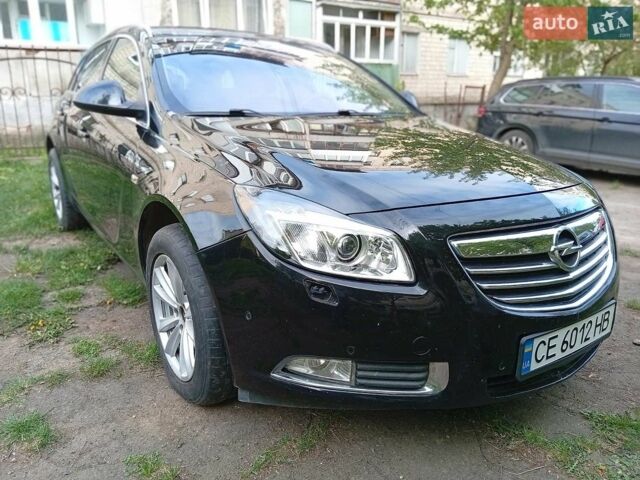 Чорний Опель Інсігнія, об'ємом двигуна 2 л та пробігом 300 тис. км за 6450 $, фото 4 на Automoto.ua