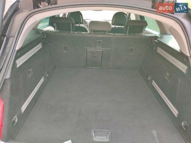 Черный Опель Инсигния, объемом двигателя 2 л и пробегом 278 тыс. км за 7500 $, фото 3 на Automoto.ua