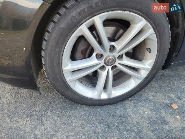 Чорний Опель Інсігнія, об'ємом двигуна 1.96 л та пробігом 225 тис. км за 7500 $, фото 17 на Automoto.ua