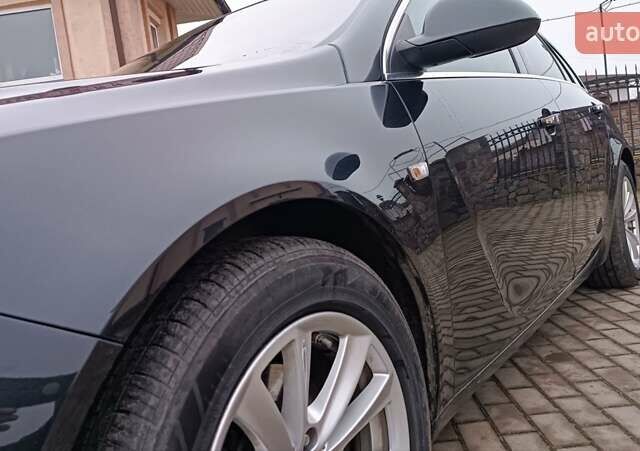 Черный Опель Инсигния, объемом двигателя 2 л и пробегом 215 тыс. км за 7250 $, фото 39 на Automoto.ua