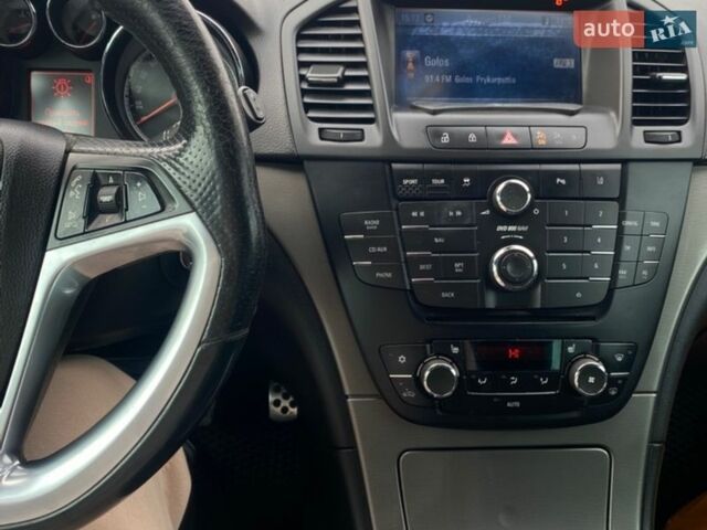 Чорний Опель Інсігнія, об'ємом двигуна 1.96 л та пробігом 260 тис. км за 5999 $, фото 14 на Automoto.ua