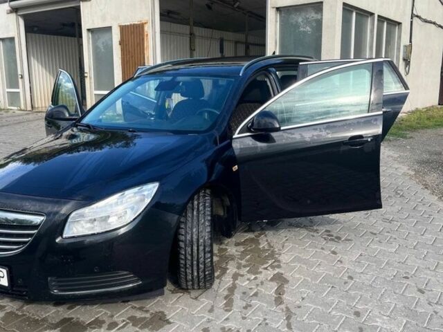 Чорний Опель Інсігнія, об'ємом двигуна 2 л та пробігом 191 тис. км за 6700 $, фото 1 на Automoto.ua