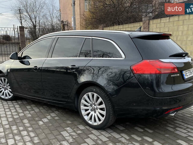 Чорний Опель Інсігнія, об'ємом двигуна 1.6 л та пробігом 200 тис. км за 8600 $, фото 4 на Automoto.ua