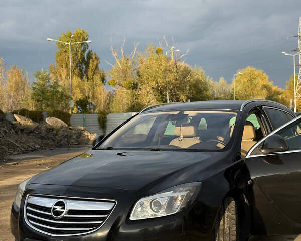 Черный Опель Инсигния, объемом двигателя 1.96 л и пробегом 277 тыс. км за 7800 $, фото 4 на Automoto.ua