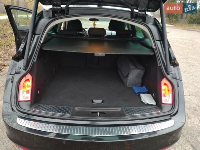 Черный Опель Инсигния, объемом двигателя 2 л и пробегом 265 тыс. км за 5750 $, фото 25 на Automoto.ua