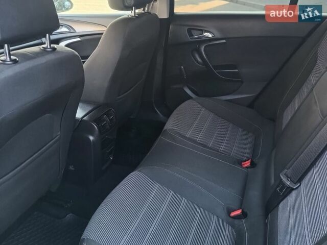 Чорний Опель Інсігнія, об'ємом двигуна 1.96 л та пробігом 259 тис. км за 6900 $, фото 24 на Automoto.ua