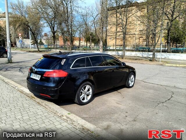 Чорний Опель Інсігнія, об'ємом двигуна 1.9 л та пробігом 280 тис. км за 8000 $, фото 4 на Automoto.ua