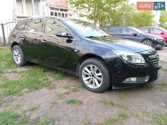 Чорний Опель Інсігнія, об'ємом двигуна 2 л та пробігом 300 тис. км за 6450 $, фото 5 на Automoto.ua