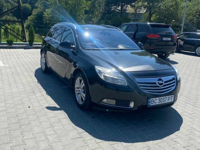 Чорний Опель Інсігнія, об'ємом двигуна 2 л та пробігом 250 тис. км за 5999 $, фото 4 на Automoto.ua