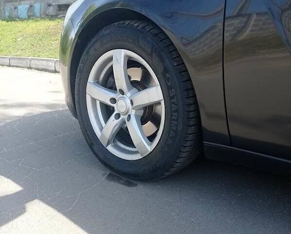 Чорний Опель Інсігнія, об'ємом двигуна 1.96 л та пробігом 358 тис. км за 6700 $, фото 1 на Automoto.ua