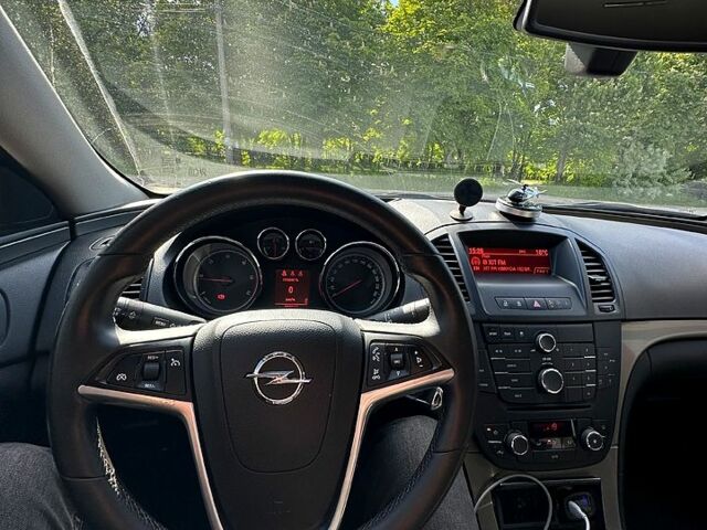 Черный Опель Инсигния, объемом двигателя 2 л и пробегом 296 тыс. км за 7000 $, фото 6 на Automoto.ua