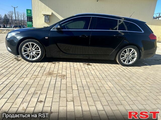 Черный Опель Инсигния, объемом двигателя 2 л и пробегом 296 тыс. км за 7000 $, фото 2 на Automoto.ua