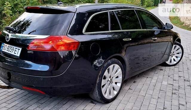 Черный Опель Инсигния, объемом двигателя 2 л и пробегом 250 тыс. км за 7400 $, фото 3 на Automoto.ua