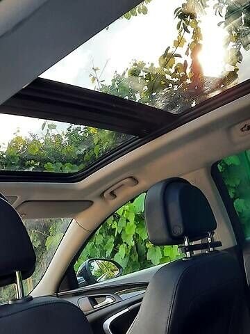 Чорний Опель Інсігнія, об'ємом двигуна 2 л та пробігом 180 тис. км за 8500 $, фото 14 на Automoto.ua