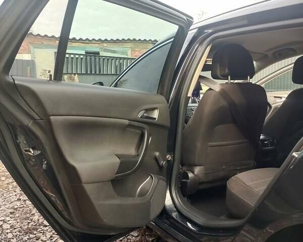 Черный Опель Инсигния, объемом двигателя 1.96 л и пробегом 206 тыс. км за 7200 $, фото 5 на Automoto.ua