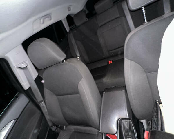 Чорний Опель Інсігнія, об'ємом двигуна 1.96 л та пробігом 215 тис. км за 7777 $, фото 4 на Automoto.ua