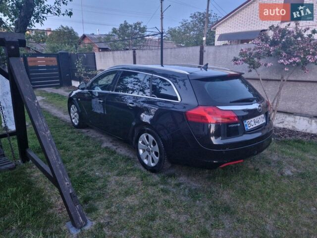 Чорний Опель Інсігнія, об'ємом двигуна 1.96 л та пробігом 300 тис. км за 9200 $, фото 14 на Automoto.ua